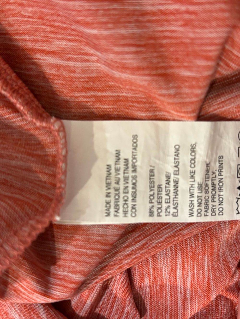Izod Men's Heathered Coral Polo - Picture 6 of 6